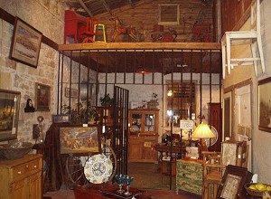 JAIL TIME: Though it once housed the infamous Marlowe Brothers, the Young County jail is now an antique shop. (Terri Hirsch)
