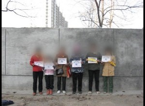 Pekings Petitionssteller heißen die Menschenrechts-Fackel willkommen