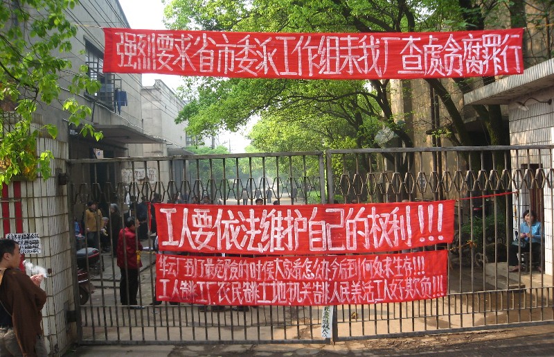 China: Tausende Fabrik-Arbeiter in Hunan im Sitzstreik