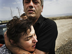 Verzweifelter Flüchtling aus Gori während ihrer Flucht aus dem umkämpften Grenzgebiet Südossetiens. (AFP Photo/Marco Longari)

