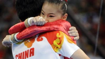 Chinas Gold-Turnerinnen und sportpolitische Interessen