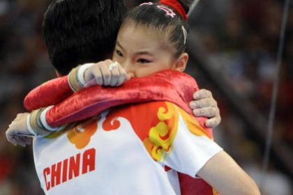 Chinas Gold-Turnerinnen und sportpolitische Interessen