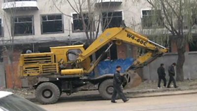 Hausbesitzer in China zündet sich an, ein anderer zu Tode geprügelt