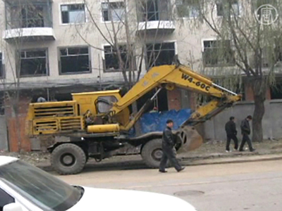 Hausbesitzer in China zündet sich an, ein anderer zu Tode geprügelt