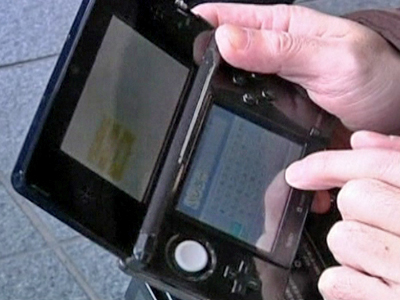 Game Fans Snap Up Nintendo’s 3DS Player at Japan Launch