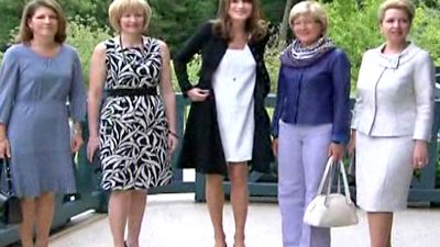 French First Lady Carla Bruni-Sarkozy Greets G8 Spouses