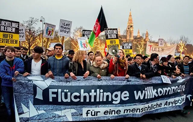 Austrian citizens and asylum seekers march during a pro-refugee protest called "Let them stay" in Vienna, Austria on November 26, 2016. Austria will hold the postponed second round of the presidential elections on December 4, 2016. / AFP / JOE KLAMAR (Photo credit should read JOE KLAMAR/AFP/Getty Images)
