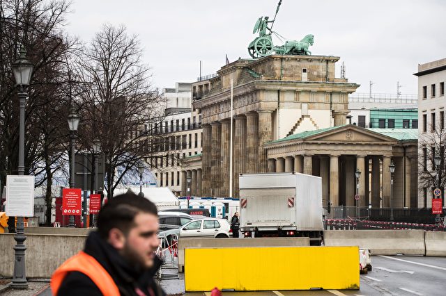 A truck is let through a concrete barrier in front of Berlin landmark Brandenburger Gate on December 29, 2016. Security around the annual New Years celebration in Berlin has been stepped up after an attack on a Christmas market in the German capital earlier in the month. / AFP / Odd ANDERSEN (Photo credit should read ODD ANDERSEN/AFP/Getty Images)