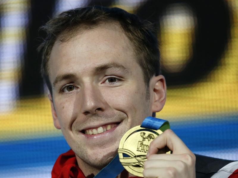 Marco Koch holt Weltmeistertitel über 100 Meter Brust