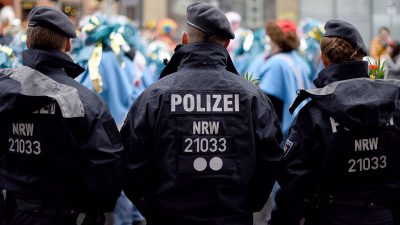 Karneval unter enormem Polizeischutz: Betonsperren, Barrieren und Polizisten mit Maschinenpistolen