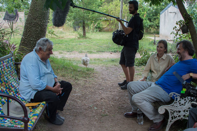 Uruguayan former President and guerrillas Jose Mujica (L) speaks during the shooting of an interview by director Emir Kusturica (R) at Mujica's home in Montevideo on December 12, 2016. Kusturica is shooting the last scenes of his documentary about Mujica. / AFP / Pablo PORCIUNCULA (Photo credit should read PABLO PORCIUNCULA/AFP/Getty Images)