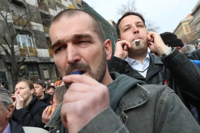 Hungarian antigovernment demonstrators whistle and clash with Orban supporters during the speech of Hungarian Prime Minister Viktor Orban at the National Museum in Budapest on March 15, 2017. Hungary celebrates the anniversary of the Hungarian Revolution, the 1848/1849 revolution in the Kingdom of Hungary grew into a war for independence from the Austrian Empire, ruled by the Habsburg dynasty. / AFP PHOTO / FERENC ISZA (Photo credit should read FERENC ISZA/AFP/Getty Images)