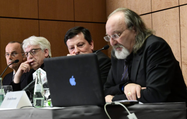 (L-R) Guenter Lubitz, father of Andreas Lubitz, a co-pilot who crashed the Germanwings flight two years ago, killing 150 people in the French Alps, spokesman Hans-Joachim Ruedel, lawyer for media affairs Andreas Behr, journalist specialized in civil aviation Tim van Beveren attend a press conference in Berlin, on March 24, 2017. The father of a Germanwings co-pilot is trying to prove his son did not crash the jet deliberately, sparking anger among victims' families. / AFP PHOTO / Tobias SCHWARZ (Photo credit should read TOBIAS SCHWARZ/AFP/Getty Images)