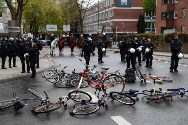 Demonstrators put bikes as barricade in front of the Maritim Hotel in Cologne, western Germany, where the congress of Germany's right-wing populist Alternative for Germany (AfD) party takes place on April 22, 2017. The anti-immigration party, which hopes to win its first seats in the national parliament in a general election in September, will gather in the western city of Cologne on April 22-23, 2017. / AFP PHOTO / Odd ANDERSEN (Photo credit should read ODD ANDERSEN/AFP/Getty Images)