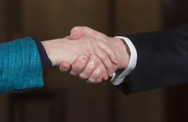 US President Donald Trump and Germany's Chancellor Angela Merkel shake hands after a press conference in the East Room of the White House March 17, 2017 in Washington, DC. Trump said Friday he and Merkel agreed on the need for a "peaceful solution" to the conflict in Ukraine. / AFP PHOTO / SAUL LOEB (Photo credit should read SAUL LOEB/AFP/Getty Images)