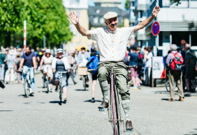 KARLSRUHE, GERMANY - MAY 27: Participants dressed in historical clothing ride high-wheel bicycles during a bicycle ballet event at Schloss Karlsruhe palace during the 2017 International Veteran Cycle Association (IVCA) rally to celebrate the 200th anniversary of the bicycle on May 27, 2017 in Karlsruhe, Germany. Karl Drais, a German inventor, built and tested the first bicycle, called the Draisine, that ran without pedals in 1817. (Photo by Alexander Scheuber/Getty Images)