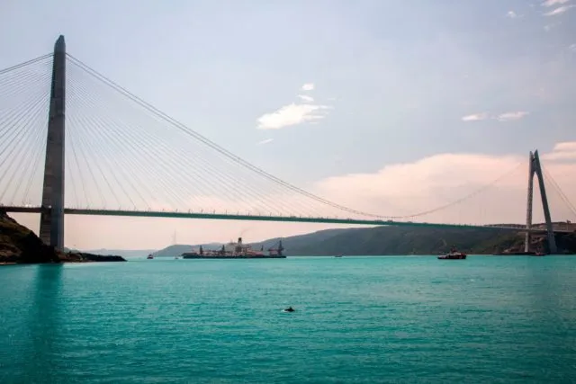 The Pioneering Spirit vessel, which will carry out construction of the offshore section of the Turkish Stream natural gas pipeline, passes the Yavuz Sultan Selim brigde on the Bosphorus on May 31,2017 in Istanbul, on the way to Anapa, on the northern Black Sea coast in Russia. / AFP PHOTO / GURCAN OZTURK (Photo credit should read GURCAN OZTURK/AFP/Getty Images)