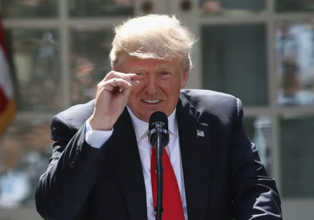 WASHINGTON, DC - JUNE 01: U.S. President Donald Trump announces his decision for the United States to pull out of the Paris climate agreement in the Rose Garden at the White House June 1, 2017 in Washington, DC. Trump pledged on the campaign trail to withdraw from the accord, which former President Barack Obama and the leaders of 194 other countries signed in 2015. The agreement is intended to encourage the reduction of greenhouse gas emissions in an effort to limit global warming to a manageable level. (Photo by Win McNamee/Getty Images)