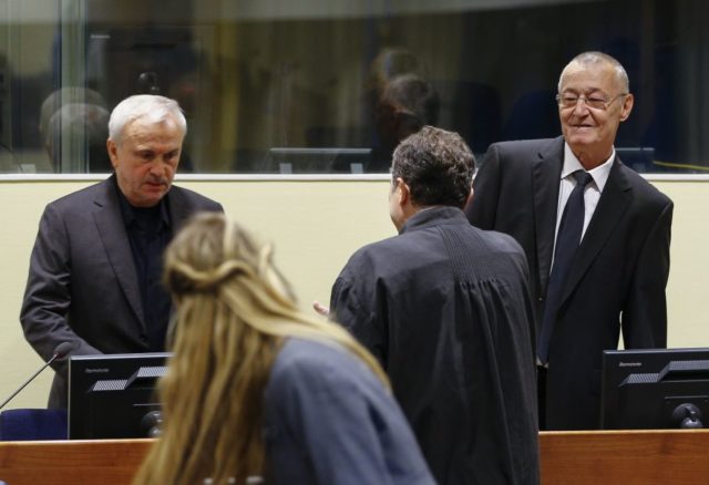 EDITORS NOTE: Graphic content / Former Serbian intelligence chiefs, Jovica Stanisic (L) and Franko Simatovic (R) appear in court as they go back on trial before a UN court in The Hague on June 13, 2017 at the United Nations Mechanism for International Criminal Tribunal, accused of running death squads that terrorised Bosnia and Croatia in the bloody 1990s Balkans wars. / AFP PHOTO / ANP / Michael Kooren / Netherlands OUT (Photo credit should read MICHAEL KOOREN/AFP/Getty Images)