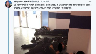 G20: Polizisten mussten am Boden ausruhen – Foto geht viral