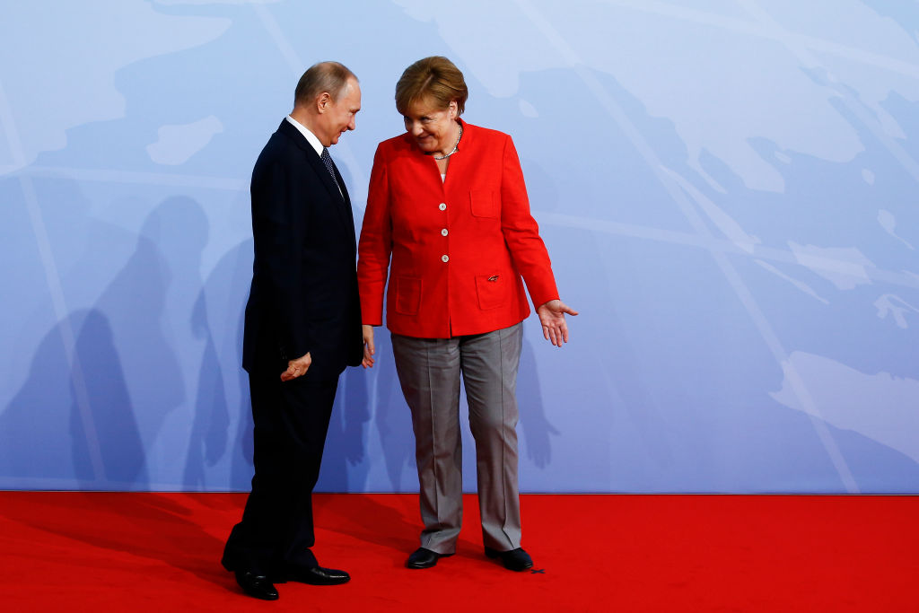 Merkel, Macron und Putin wollen Ukraine-Waffenstillstand umsetzen