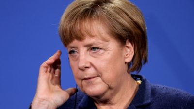 Grüne rufen Merkel zu Teilnahme an Auto-Gipfel auf