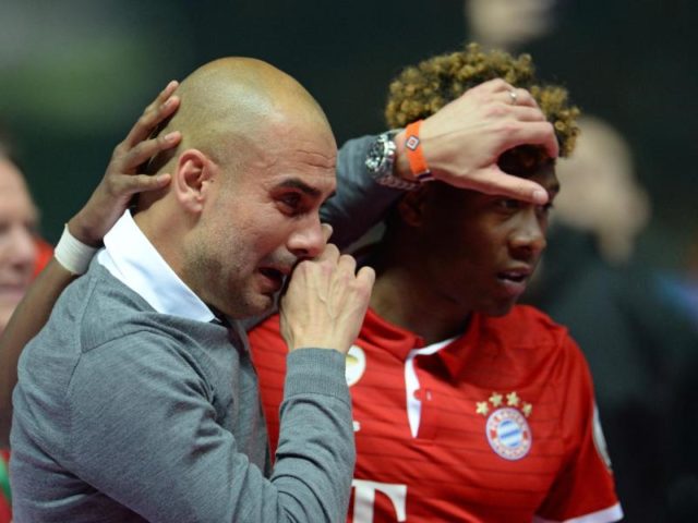 Bei Bayern-Trainer Pep Guardiola (l) kullern nach dem Sieg im Finale die Tränen. Foto: Andreas Gebert/dpa