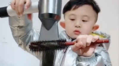 6-jähriger Friseur schneidet gut ab