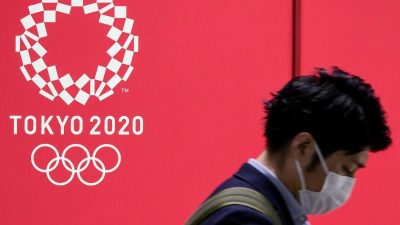 «Immer lächeln» – Japans fragwürdiger Neuanfang zu Olympia