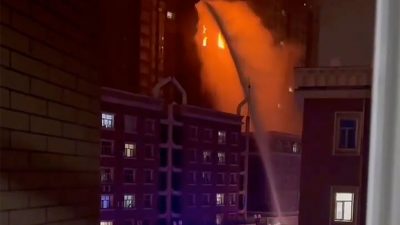 Corona-Lockdown verhindert Feuerwehr: Zehn Tote bei Hochhausbrand in China (+Video)