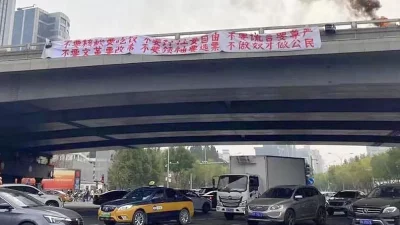 Protest gegen Null-COVID-Politik: Chinas mutiger Brückenmann für Friedensnobelpreis nominiert