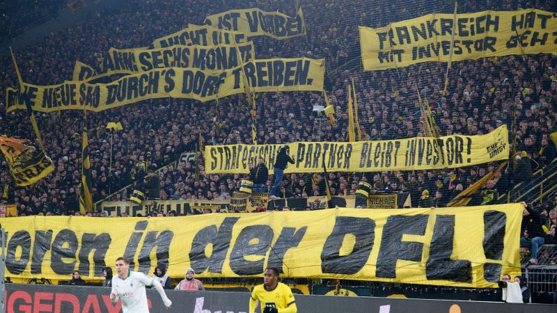 Dortmunds Fans demonstrieren gegen Investoren in der DFL.