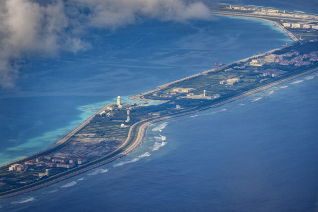 SPRATLY ISLANDS, AT SEA - OCTOBER 25: Buildings and structures are seen on the artificial island built by China in Mischief Reef on October 25, 2022 in Spratly Islands, South China Sea. China has progressively asserted its claim of ownership over disputed islands in the South China Sea by artificially increasing the size of islands, creating new islands and building ports, military outposts and airstrips. The South China sea is an important trade route and is of significant interest as geopolitical tensions remain high in the region. (Photo by Ezra Acayan/Getty Images)