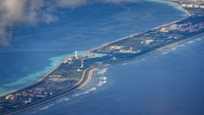 SPRATLY ISLANDS, AT SEA - OCTOBER 25: Buildings and structures are seen on the artificial island built by China in Mischief Reef on October 25, 2022 in Spratly Islands, South China Sea. China has progressively asserted its claim of ownership over disputed islands in the South China Sea by artificially increasing the size of islands, creating new islands and building ports, military outposts and airstrips. The South China sea is an important trade route and is of significant interest as geopolitical tensions remain high in the region. (Photo by Ezra Acayan/Getty Images)