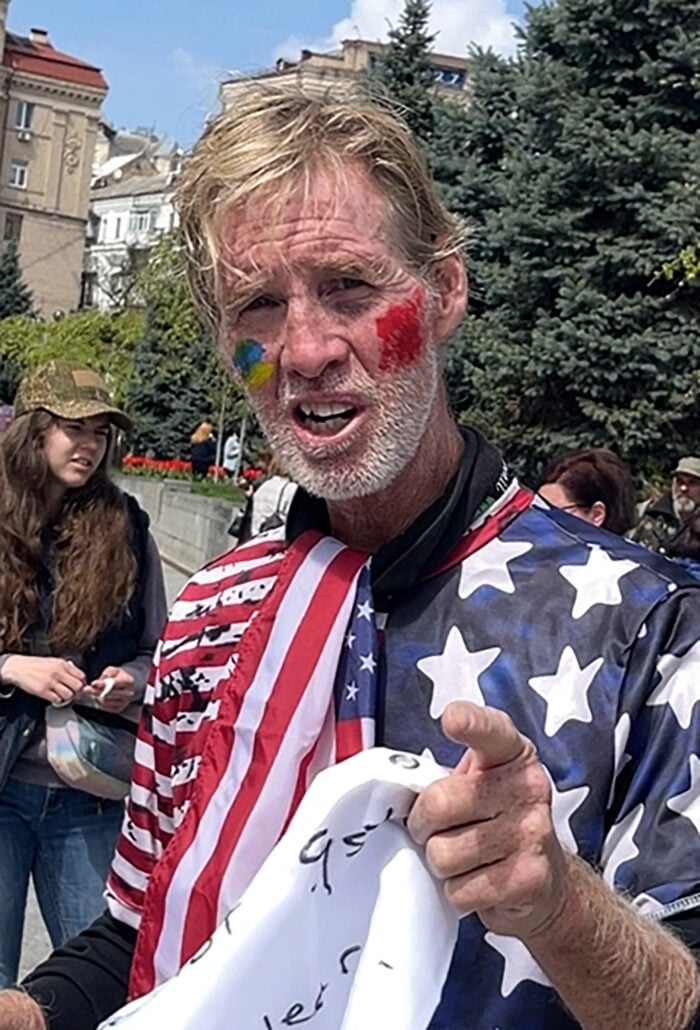 This screengrab taken from AFPTV on September 16, 2024 shows Ryan Wesley Routh speaking during an interview at a rally to urge foreign leaders and international organisations to help provide humanitarian corridors for the evacuation of civilians and Ukrainian servicemen from Mariupol in central Kyiv on April 27, 2022, amid Russia's invasion of Ukraine. US media said it was Routh, 58, who was arrested after US Secret Service agents "opened fire on a gunman" carrying an AK-47 style rifle near the boundary of Donald Trump's Florida golf course where the former president was golfing on September 15, 2024. (Photo by Nicolas GARCIA / AFPTV / AFP) (Photo by NICOLAS GARCIA/AFPTV/AFP via Getty Images)