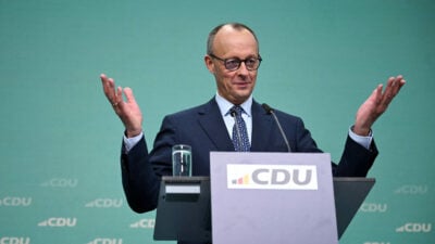 Leader and top candidate for chancellor of Germany's Christian Democratic Union (CDU) Friedrich Merz gestures as he addresses a press conference following a CDU party leadership meeting at the party's headquarters, the Konrad-Adenauer-Haus, in Berlin, on February 24, 2025, one day after the German general elections. Germany's election winner Friedrich Merz has vowed to rule Europe's largest economy by returning to his Christian Democrat party's conservative roots, ease restraints on business and crack down on irregular immigration. (Photo by INA FASSBENDER / AFP) (Photo by INA FASSBENDER/AFP via Getty Images)