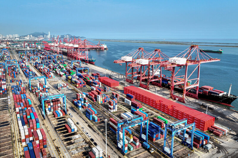 Shipping containers and gantry cranes are seen at a port in Lianyungang, in eastern China's Jiangsu province on August 7, 2024. China's exports grew slightly slower than expected in July while imports surged, official figures showed on August 7, as the world's second-largest economy charts an uneven recovery. (Photo by AFP) / China OUT (Photo by STR/AFP via Getty Images)