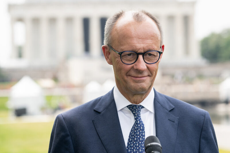 German Chancellor Friedrich Merz speaks to reporters near the Lincoln Memorial on the US National Mall, following his meeting at the White House with US President Donald Trump in Washington, DC, on June 5, 2025. German Chancellor Friedrich Merz came through his Oval Office encounter with Donald Trump relatively unscathed Thursday -- despite differences over Ukraine as the US president said it might be better to let Moscow and Kyiv fight it out like children. Merz also hailed Trump as being the "key person in the world" when it came to ending the Ukraine war, saying the US leader could "really do that now by putting pressure on Russia." (Photo by SAUL LOEB / AFP) (Photo by SAUL LOEB/AFP via Getty Images)