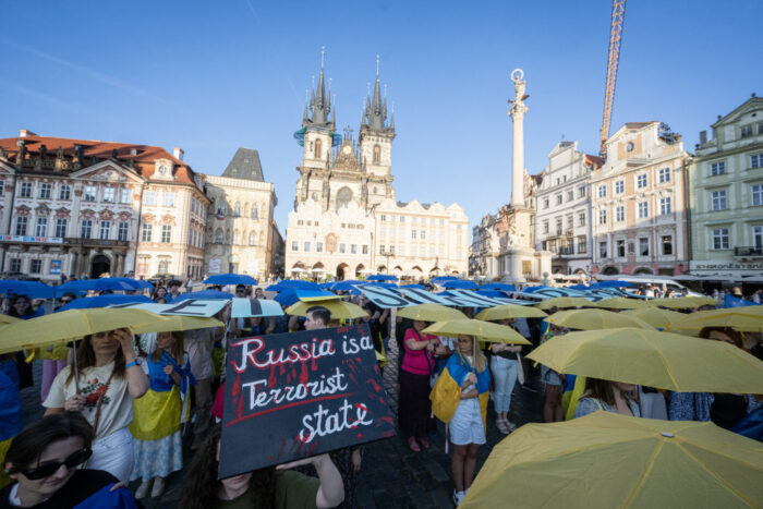 Demonstrators hold yellow and blue umbrellas as they protest against Russia's war in Ukraine and demand the support for efficient air defense for Ukraine, on September 7, 2024 in Prague, Czech Republic. (Photo by Michal Cizek / AFP) (Photo by MICHAL CIZEK/AFP via Getty Images)