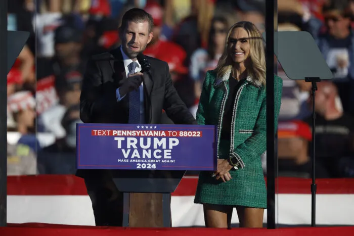 BUTLER, PENNSYLVANIA - OCTOBER 05: Eric Trump and his wife, Republican National Committee co-chair Lara Trump, address a campaign rally at the Butler Farm Show grounds on October 05, 2024 in Butler, Pennsylvania. This is the first time that Republican presidential nominee, former President Donald Trump has returned to Butler since he was injured during an attempted assassination on July 13. (Photo by Kevin Dietsch/Getty Images)