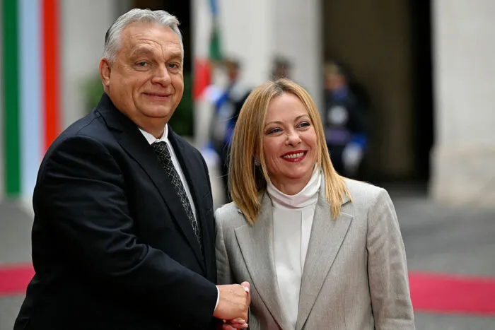 Italy's Prime Minister, Giorgia Meloni welcomes Hungary's Prime Minister Viktor Orban at Palazzo Chigi prior their meeting in Rome on October 27, 2025. (Photo by Tiziana FABI / AFP) (Photo by TIZIANA FABI/AFP via Getty Images)